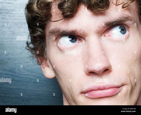 Young Man With Large Eyes Stock Photo Alamy