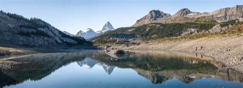 Prominent Mountain Reflecting In Alpine Lake Panorama Mt Assiniboine