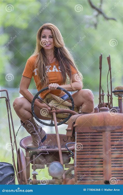 Brunette Model With A Tractor Stock Photo Image Of Brunette Beauty