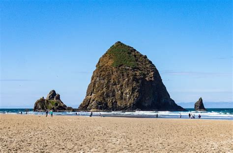Haystack Rock Oregonthe Pacific Coastline Is Perforated With Wave