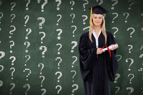 Premium Photo Blonde Student In Graduate Robe Holding Her Diploma