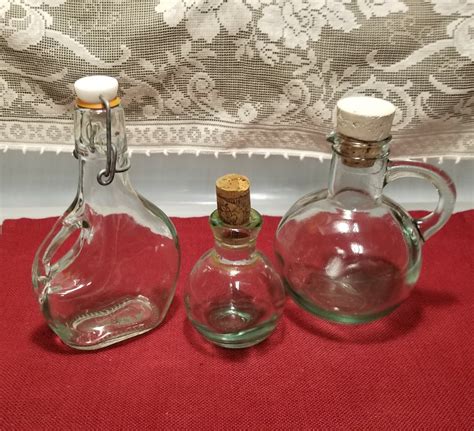 vintage clear green tinted glass bottles set of three etsy