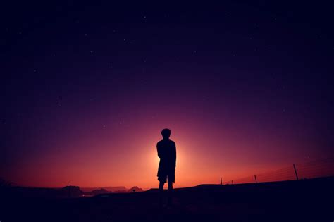 Boy standing under tree sunset hd : silhouette-of-boy-standing-at-the-end-of-dusk image - Free ...