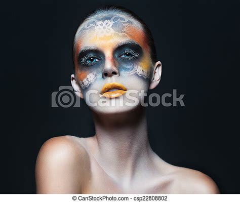 Portrait Of Beautiful Glamor Woman With Dark Eye Make Up In The Form Of
