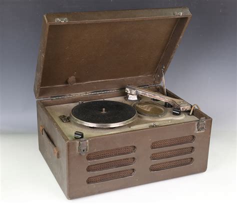 A Decca Portrola Dual Record Playerradio With Hinged Lid And Case