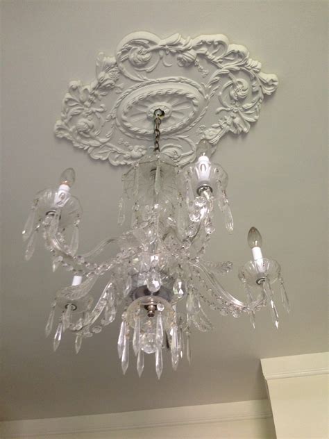 They really filled up the wall above, which used to be completely blank and boring. Ekena Millwork Strasbourg Two Piece Ceiling Medallion ...