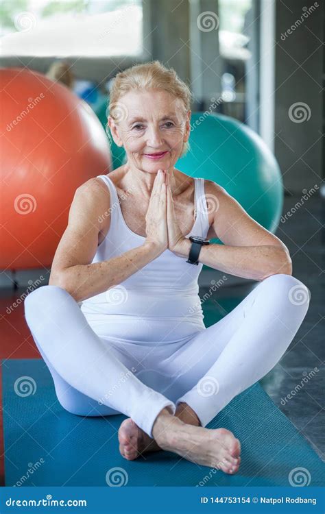 Senior Woman Doing Yoga In Fitness Gym Aged Lady Exercising Old Female Workout Mature Sport