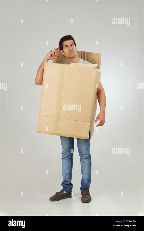Man Wearing Cardboard Box Thinking Stock Photo Alamy