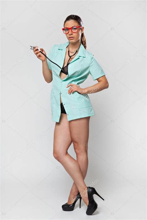 Sexy Woman Doctor With A Stethoscope And Red Glasses Stock Photo By