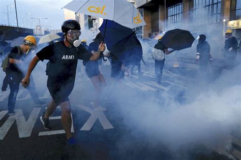 The Latest Hong Kong Police Battle Protesters With Tear Gas The