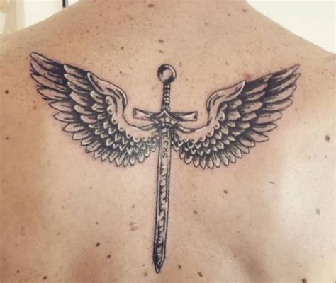 20 Sword Tattoo Motifs And Their Symbolic Which Means Tattoos