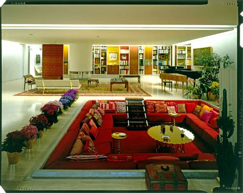 Conversation pit is an architectural feature, popular in the period between 1950s and 1970s, that looks like a small pit in the floor furnished with seats and often a table. A History Of The Conversation Pit - Something Curated