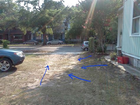 Not difficult project, but needs some planning. How do I improve the drainage of this grass driveway ...