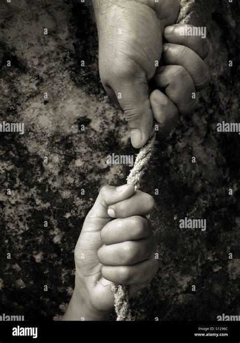 Hands Holding Rope Hi Res Stock Photography And Images Alamy