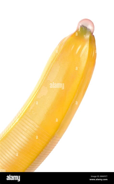 Close Up Of Banana With Red Condom Isolated On White Stock Photo Alamy