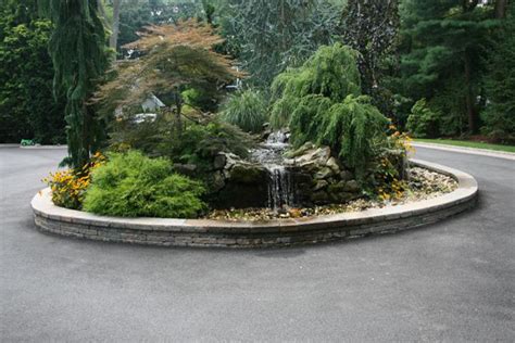 Circular Driveway Design With Water Feature Landscape New York By