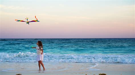 Adorable Little Girl With Flying Kite On Tropical Beach Kid Play On