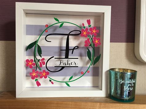 Family monogram shadow box made as a gift for the neighbours : cricut