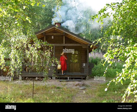 Reeking Sauna By Heating A Timber Sauna In The Nature In Finland Stock