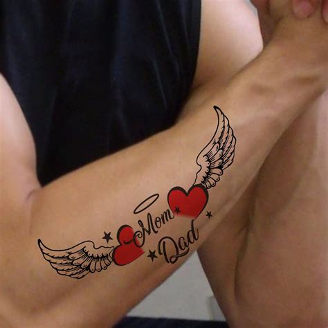 Heart Wings Mom Dad Tattoo In 2020 Mom Dad Tattoos Dad Tattoos Mom