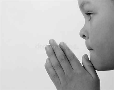 Boy Child Praying To God With Hands Together Stock Photo Stock Image
