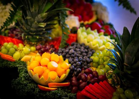 Many Different Types Of Fruits And Vegetables On Display