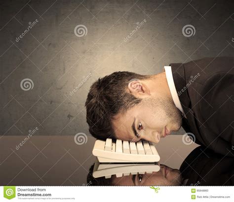 Frustrated Businessmanand X27s Head On Keyboard Stock Photo Image Of