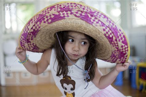 Portrait Of A Young Girl Wearing A Sombrero Stock Photo Offset