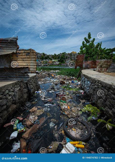 Aqueduct Full Of Garbage And Waste By The Ozama River In Poor Los