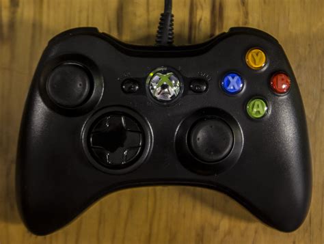 If it is a xbox 360 controller, then for wired use, you need a wired xbox 360 controller. Is this Xbox 360 controller fake? How can I tell? - Arqade