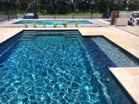 A Compass Pools 83m Contemporary Install In Viridian From The Bi Luminite Range Of Colours