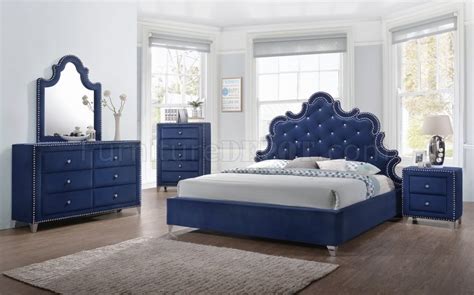 Pair navy with hues adjacent to it on the color wheel—purple and turquoise—for this navy blue bedroom idea. Caroline Bedroom in Navy Velvet by Meridian w/Options