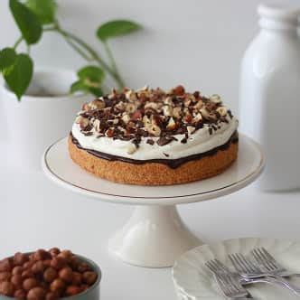 Oh Sweet Day Tackles Our Chocolate Ganache Hazelnut Cake America S