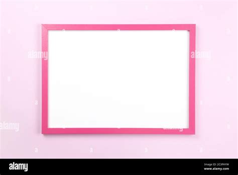 Pink Rectangular Frame With Empty Clean White Center On Pastel Pink