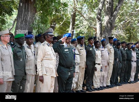 Somalia Police Commissioner Maj Gen Abdi Hassan Mohamed Salutes During A Pass Out Ceremony For
