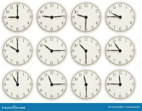 Set Of Office Clocks Showing Various Time Isolated On White Background