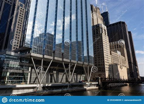 Modern And Old Office Skyscrapers Along The Chicago River In Downtown