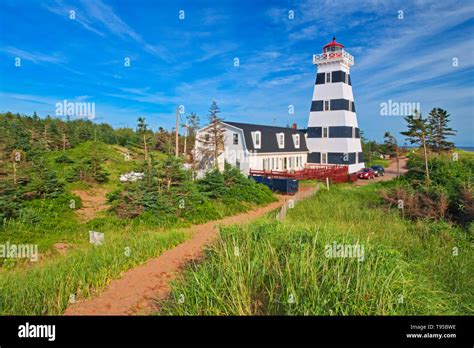 West Point Lighthouse And Red Sand West Point Prince Edward Island