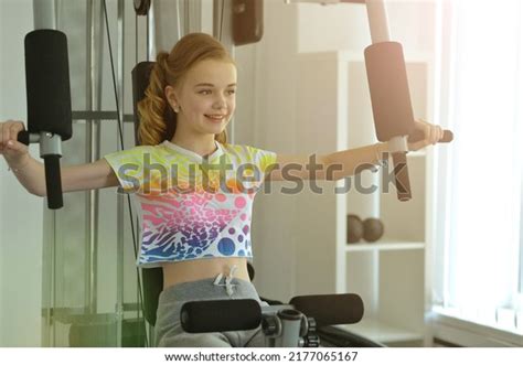 Стоковая фотография 2177065167 Beautiful Athletic Teen Girl Exercising