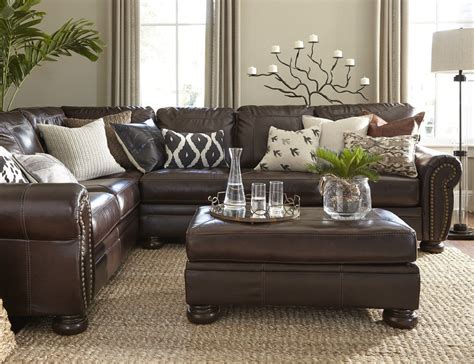 A Brown Leather Butterfly Chair Punches Things Up With A Contrasting Shade A Large Brown Couch