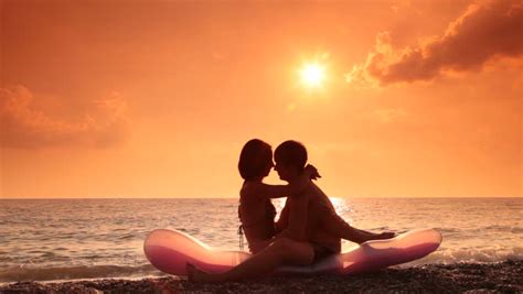 Kissing Couple On The Evening Beach Stock Footage Video 5450714