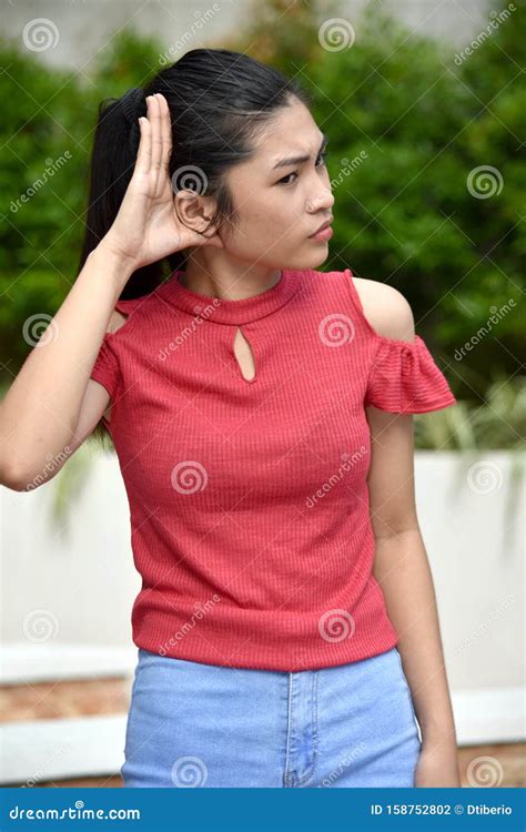 A Cute Filipina Juvenile Listening Stock Photo Image Of Hear