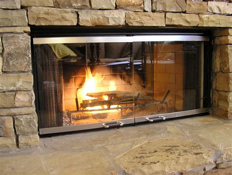 Pin By Kellie Giacchi On Mod Living Room Fireplace Glass Doors Glass Fireplace Fireplace Doors