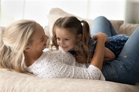 Loving Happy Young Mother Cuddling Laughing Cute Little Daughter Stock Image Image Of
