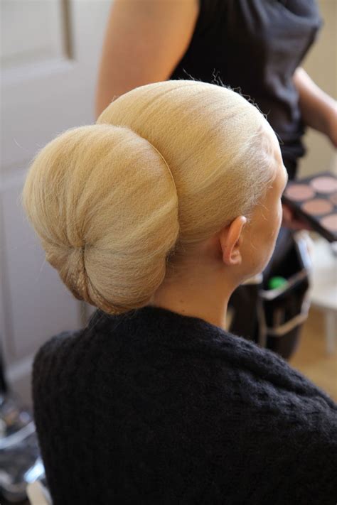 Different colors and different sizes on different girls based on amount of hair and head size, makes it very easy to create different sized buns. The Donut Bun @ Jensen s/s 2012 @Cori Mallory now that's a ...