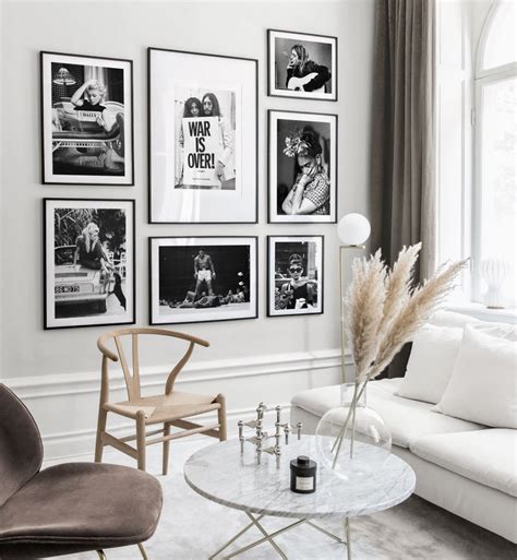 Stylish gallery wall in black and white with iconic photo art and black ...