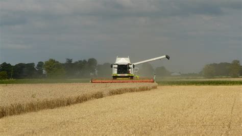 Free Images Tractor Field Asphalt Agriculture Harvester Combine