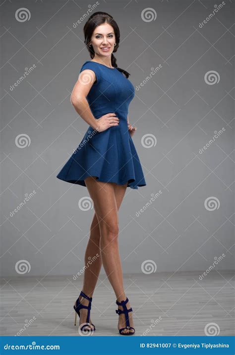 Beautiful Young Woman In A Blue Dress Stock Image Image Of Shapely