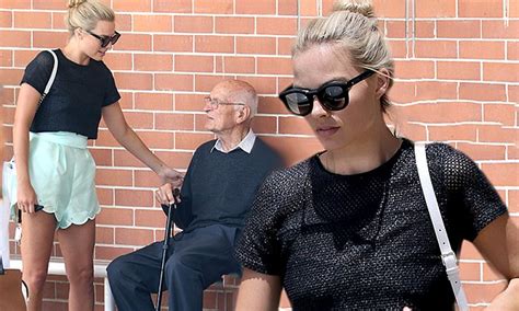 Margot Robbie Steps Out In Mesh Top As She Visits Church With Her