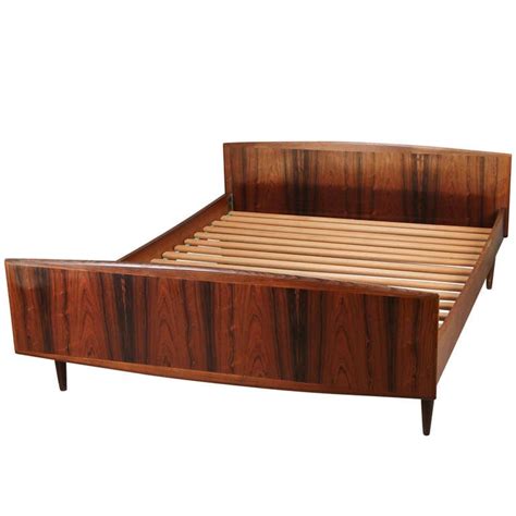 Both of these preowned categories offer furniture that has either been restored to its original condition or has been changed from its original color. 1960s Danish Modern Figured Rosewood Bed at 1stdibs
